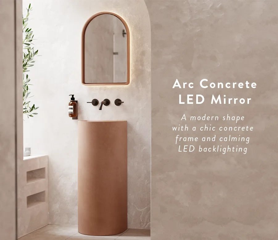 An arc concrete LED mirror and Aurora Concrete basin in a bright modern bathroom and ensuite.