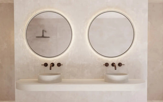 An ensuite with two Sand Comet Concrete Basins with matching large Sol Concrete Mirrors.