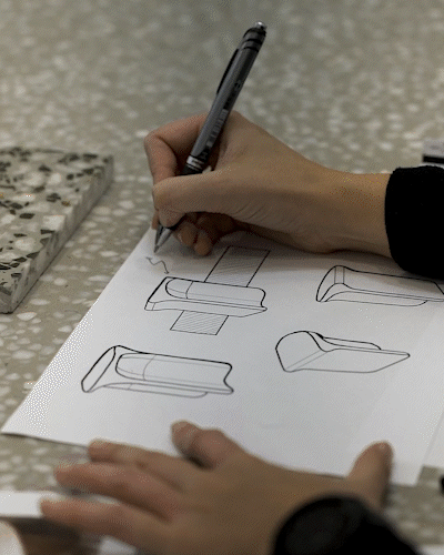 Images of the Blend Concrete Design team designing and fabrication concrete furniture.