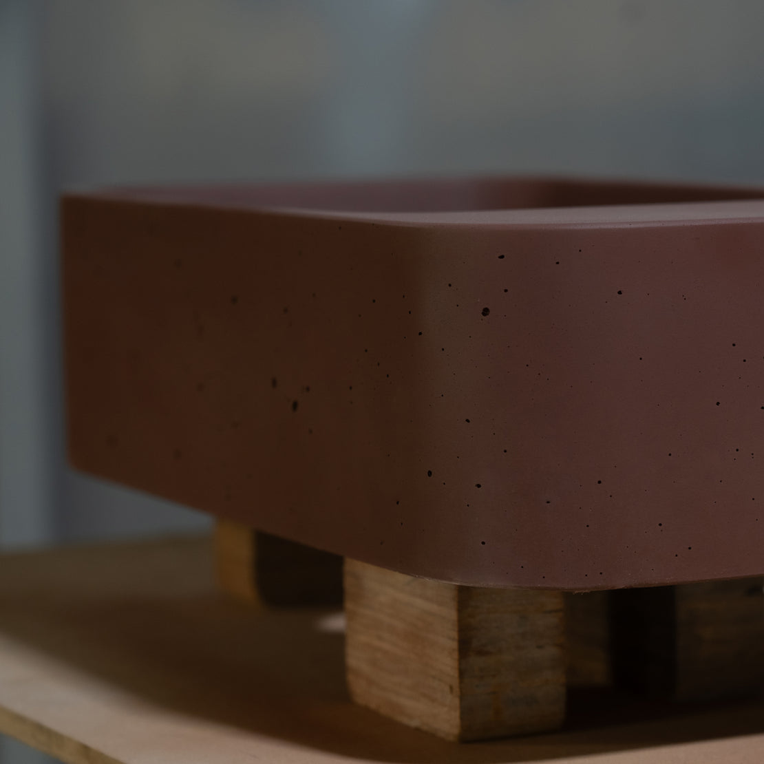 The Elm Concrete Wall Hung Basin in Merlot waiting to be sealed in the Blend workshop.