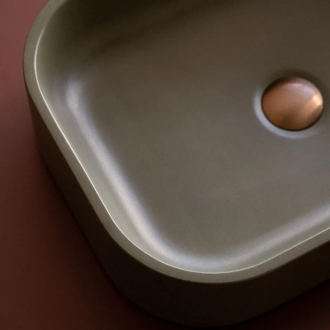 A close up of the Titan Concrete Basin in Artichoke.