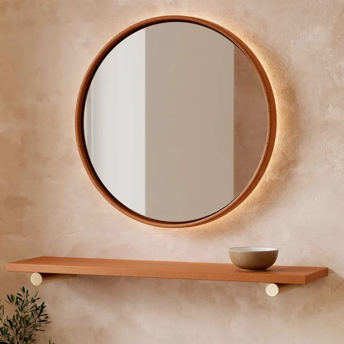 The Sol Concrete Mirror in Dingo in the entryway of a home