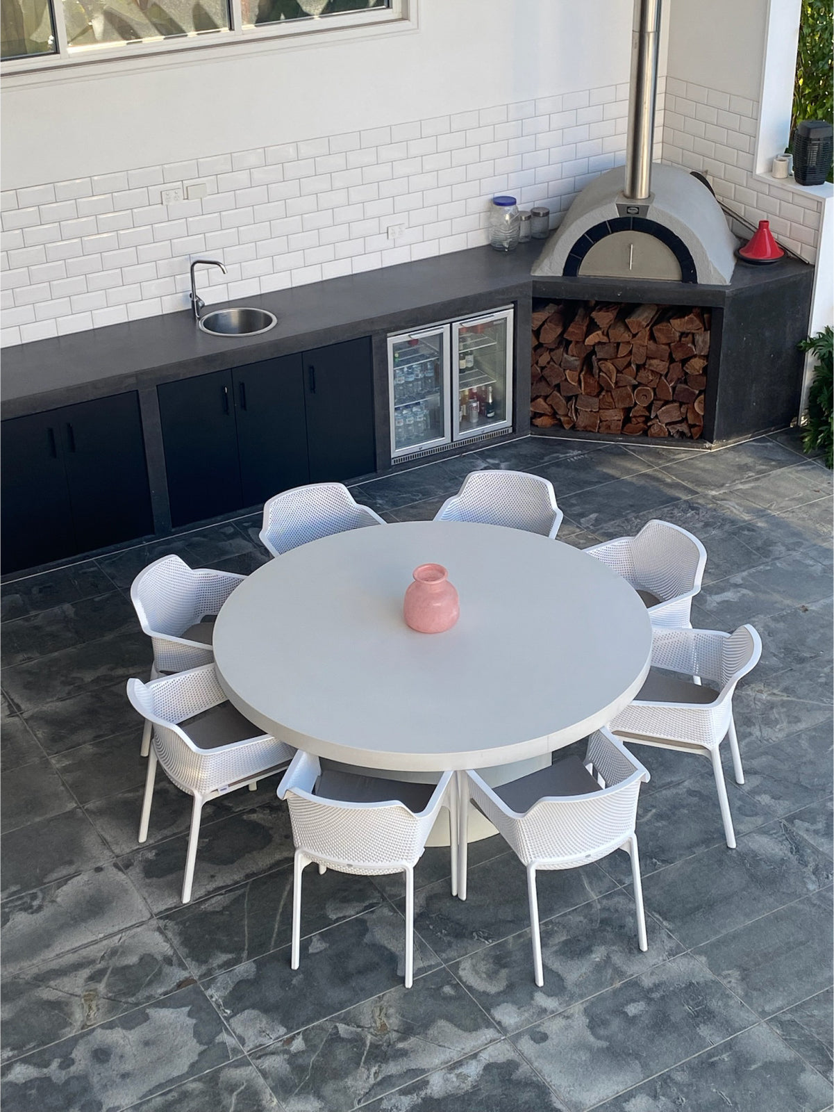 Large Tuscan Concrete Dining Table in Whitehaven in a outdoor area at a home