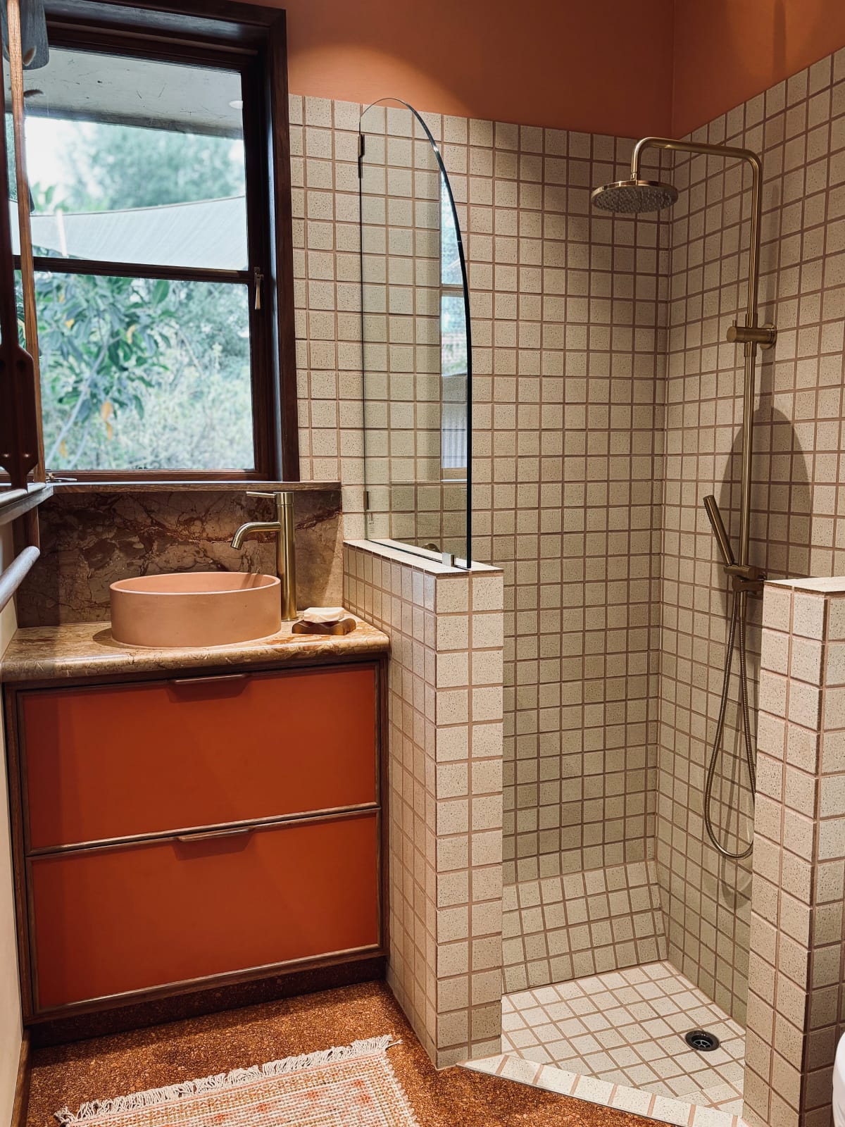 Comet Concrete Basin in Dingo with chrome tapware in a vibrant bathroom setting