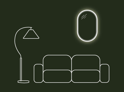 A large Lunar Concrete LED Mirror on a wall behind a sofa, accompanied by a standing lamp.