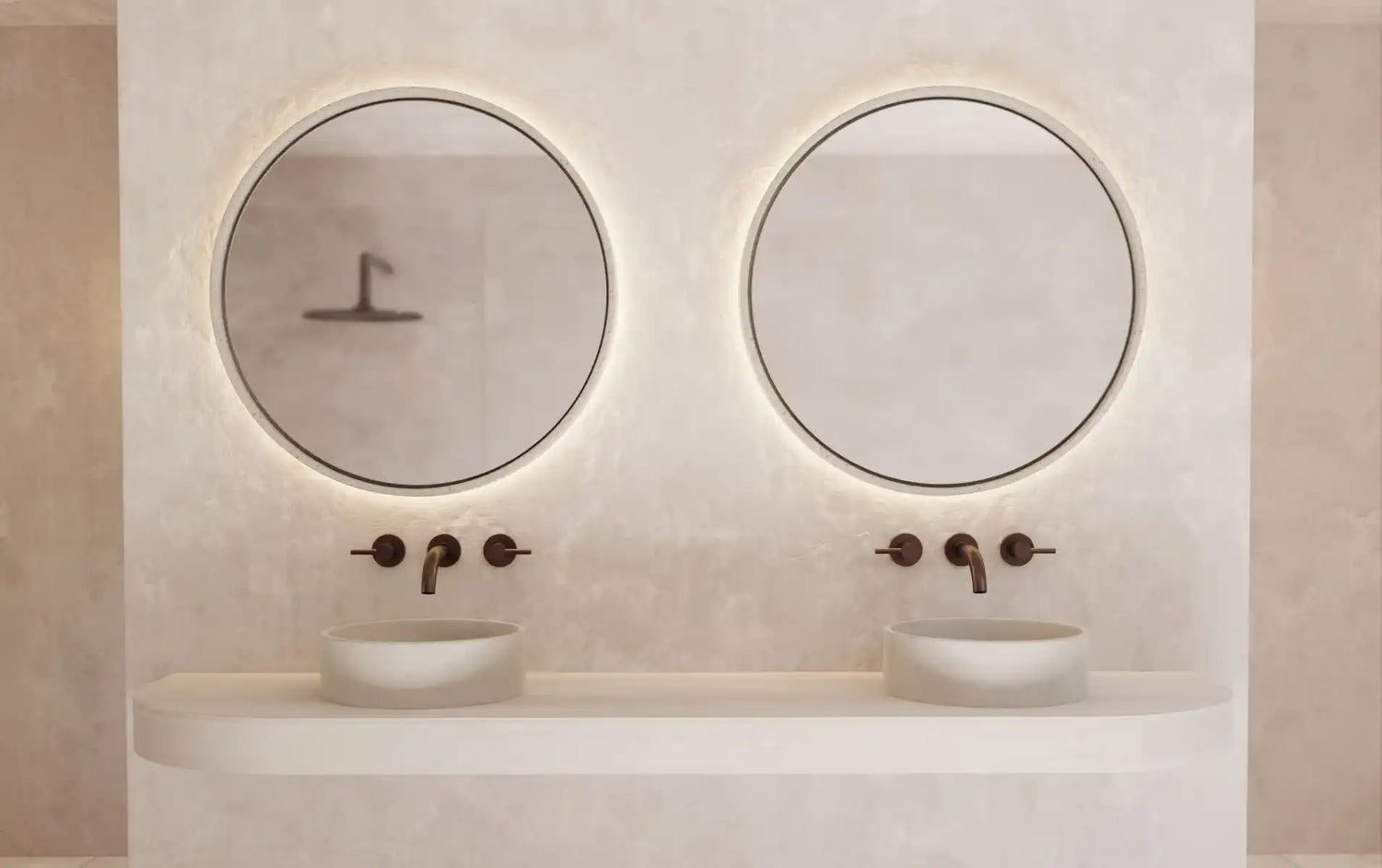 An ensuite with two Sand Comet Concrete Basins with matching large Sol Concrete Mirrors.