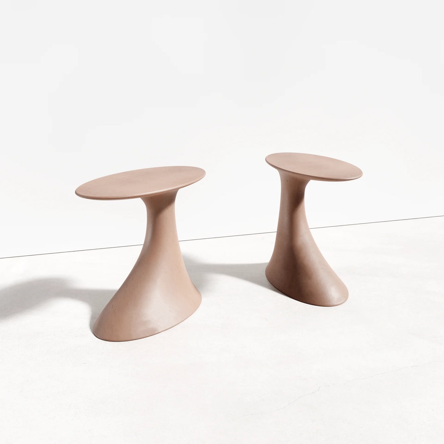 A set of two Oasis Concrete Side Tables in the colour Dingo.
