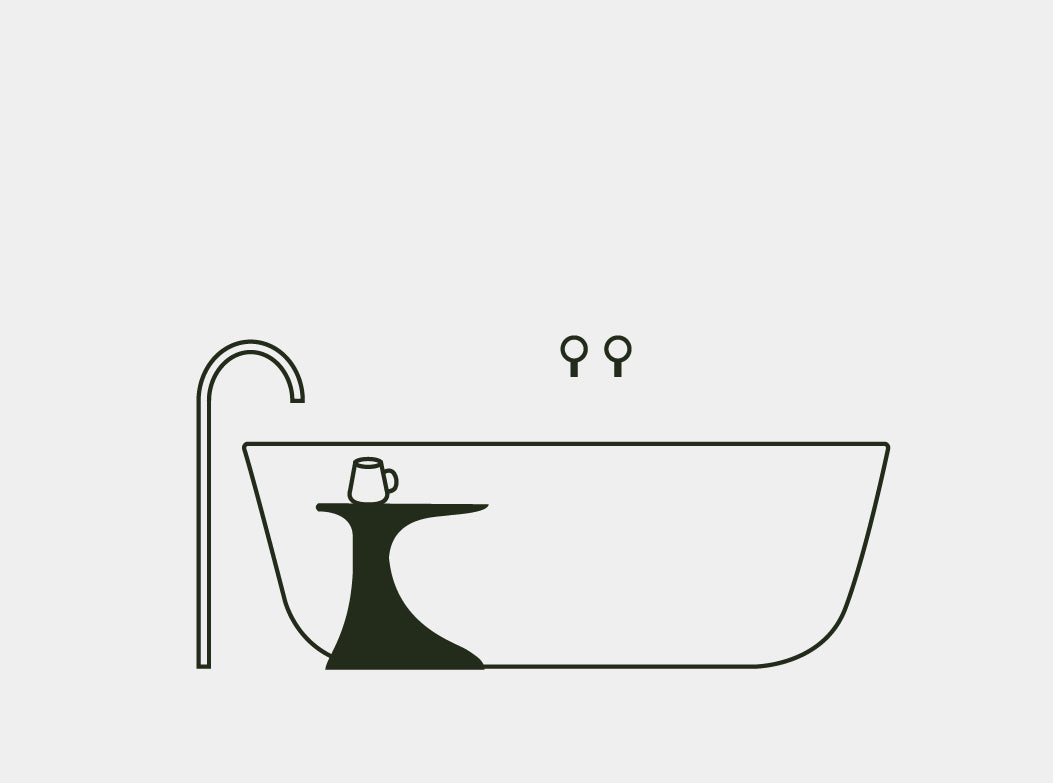 A line illustration of the Oasis Concrete Side Table next to a bath with a mug resting on top.