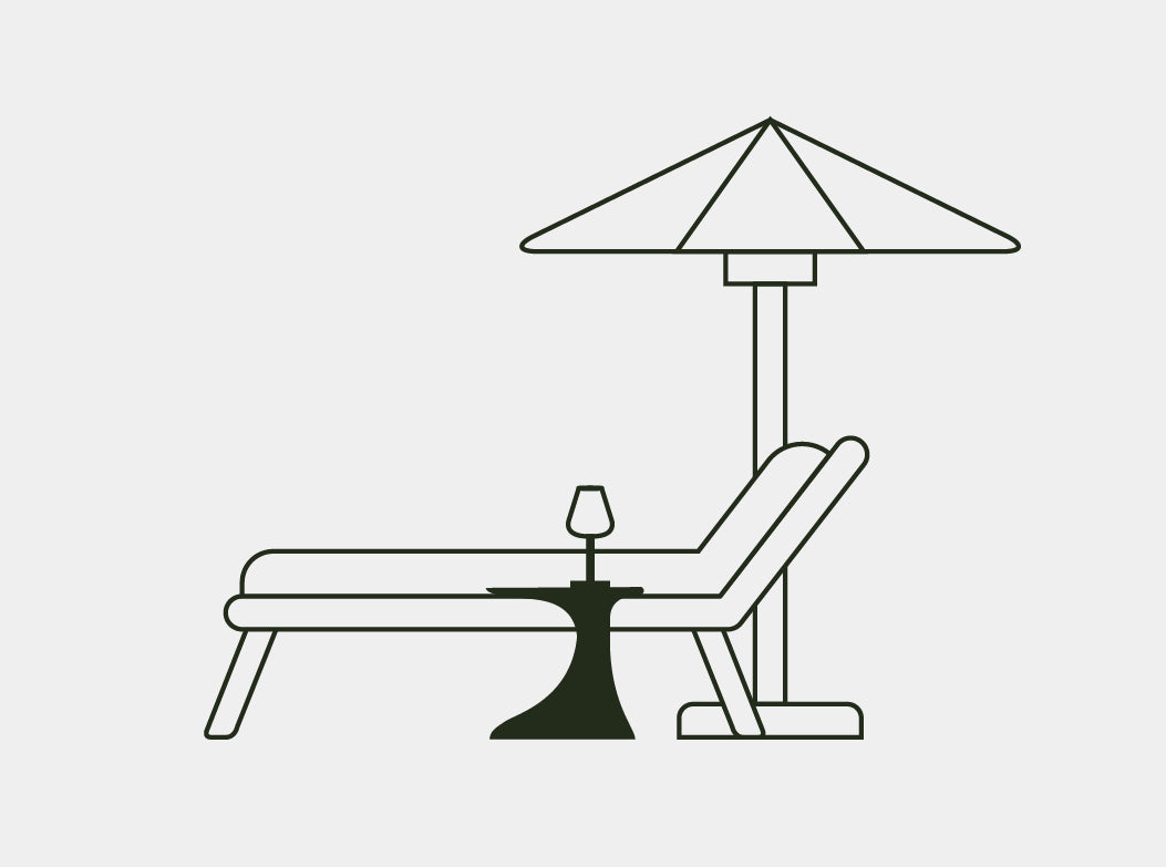 A line illustration of the Isle Concrete Side Table next to a sun lounge.