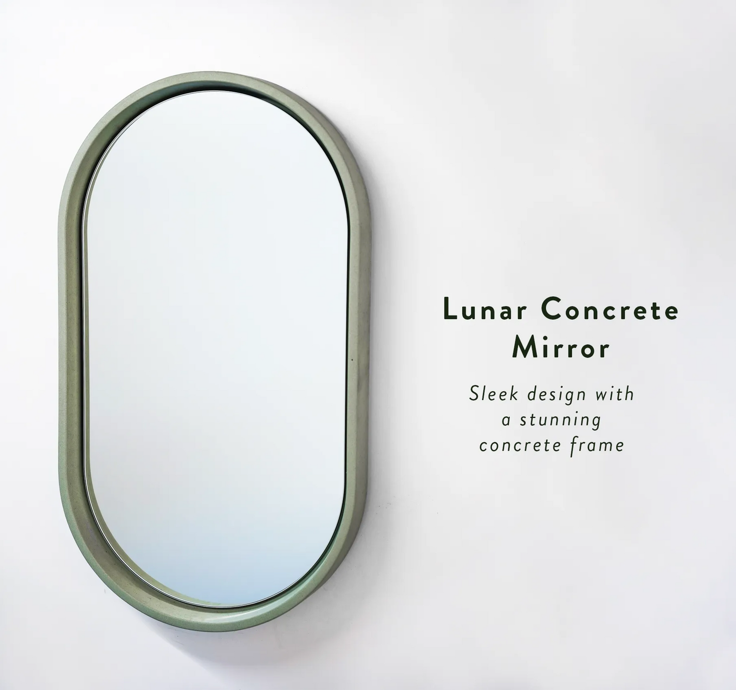 A Rainforest Green Lunar Concrete Mirror on a white wall with the text "Lunar Concrete Mirror - sleek design with a stunning concrete frame."