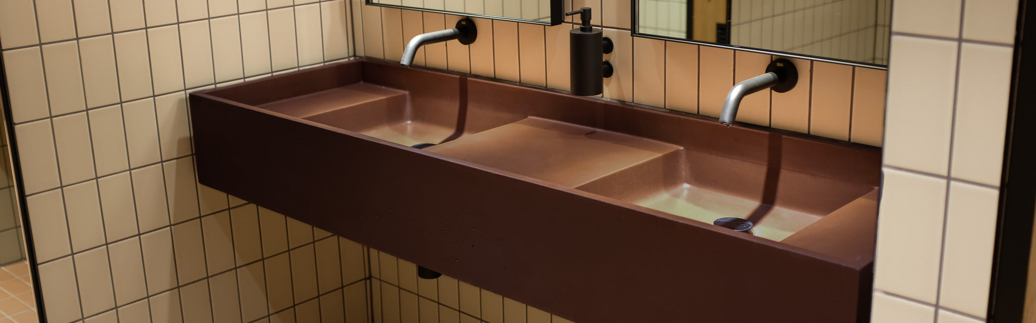 Close up of a custom concrete vanity basin.